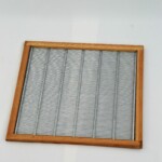 Grille-a-reine-metal-bois-scaled.jpg